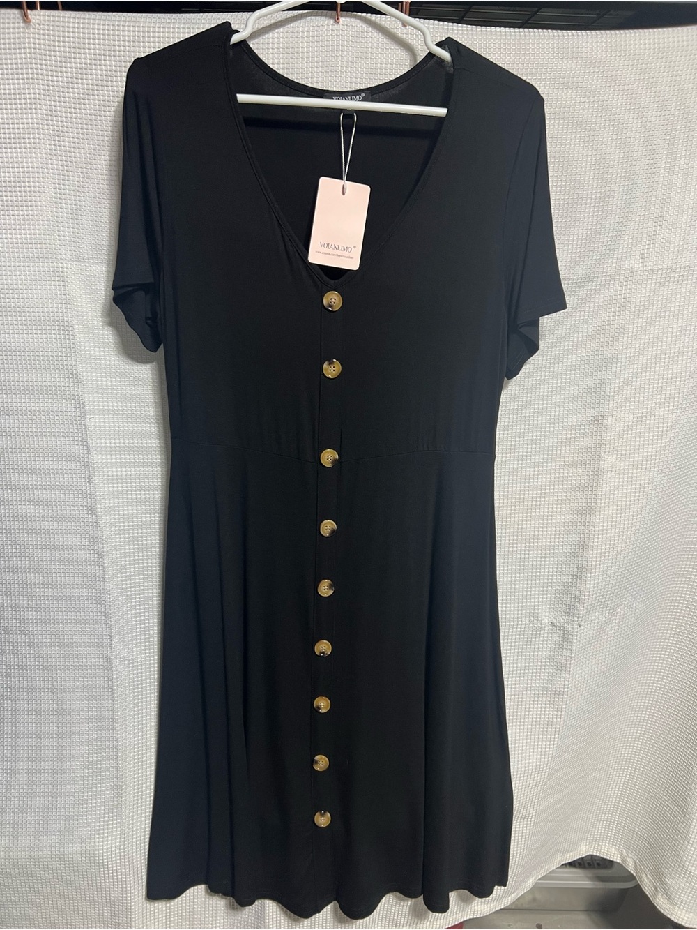 Voianlimo black dress with buttons.
